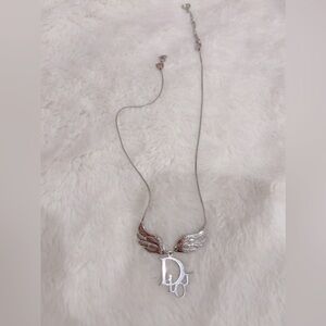 Christian Dior winged logo